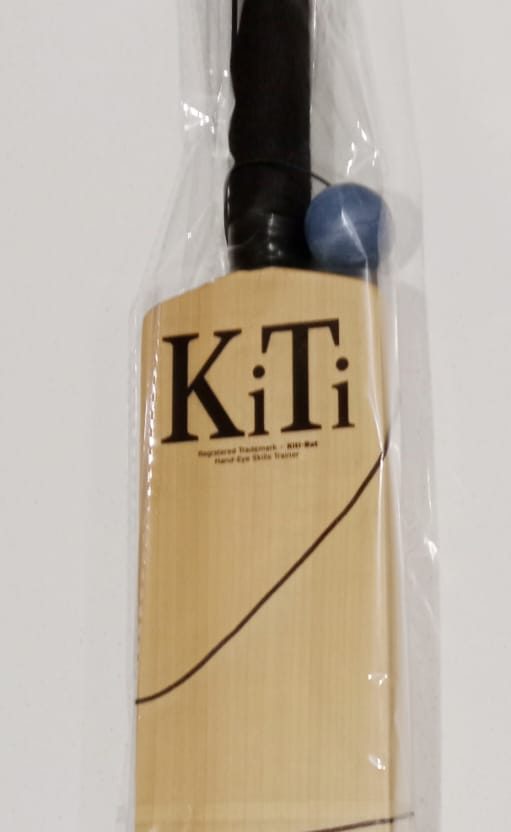 A finished KiTi-Bat: the KiTi mark on the blade, black rubber grip and the blue ball on its elastic