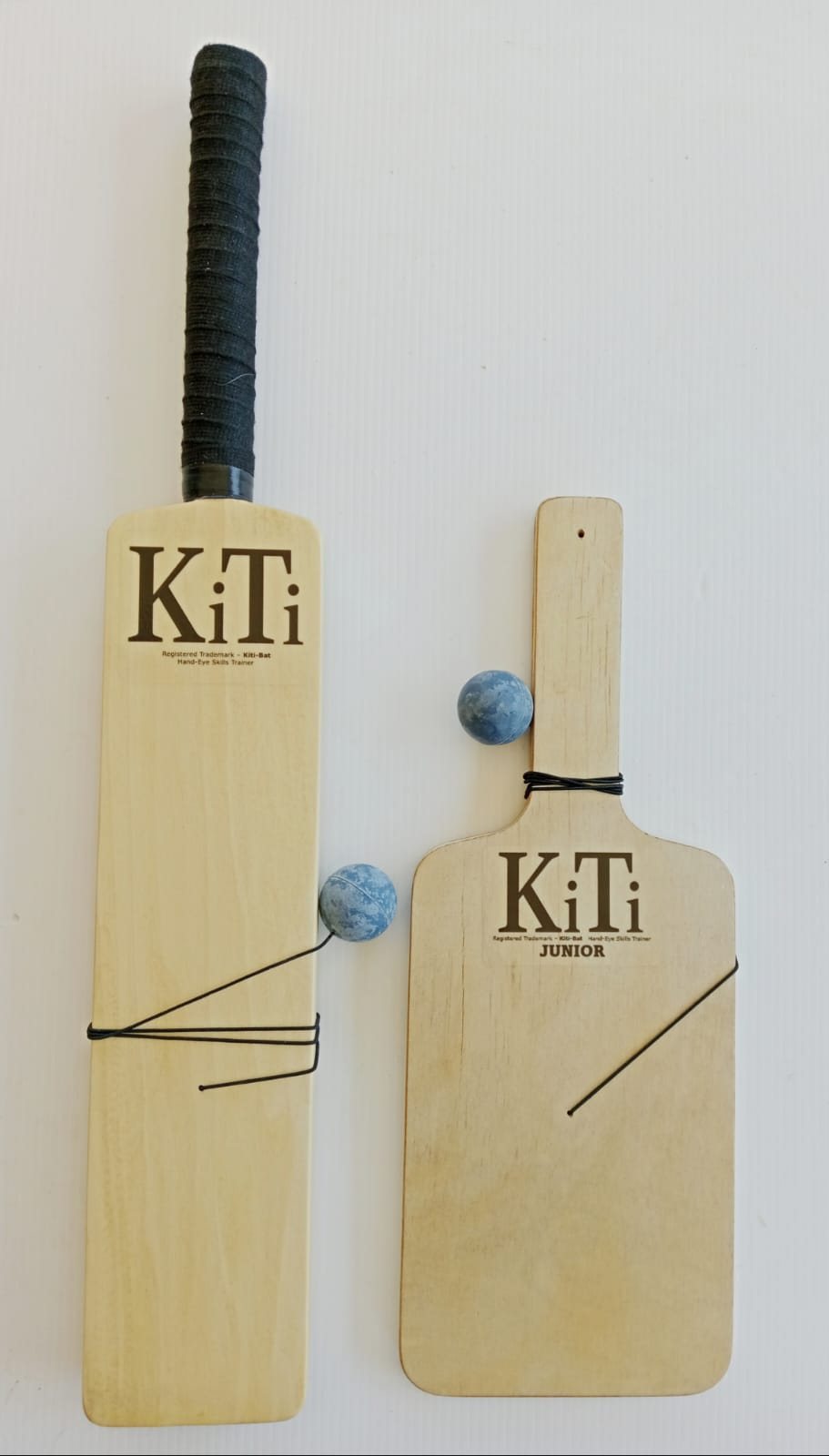A KiTi-Bat and a KiTi Junior side by side, showing the difference in length and width